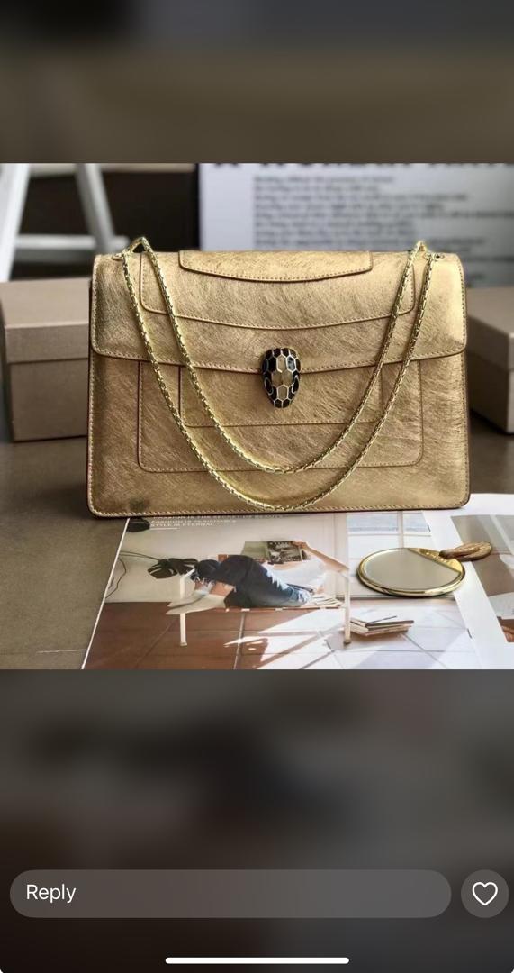 Gold Bulgari leather bag. Extremely pretty. A must have for every woman